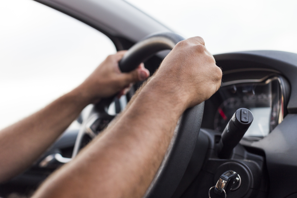 hands on steering wheel